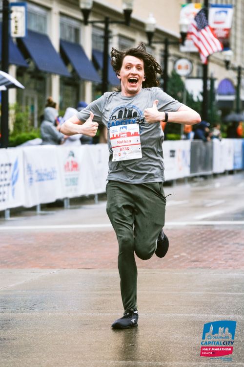 Finishing the Columbus Cap City Quarter Marathon.